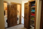Upstairs laundry & linen closet